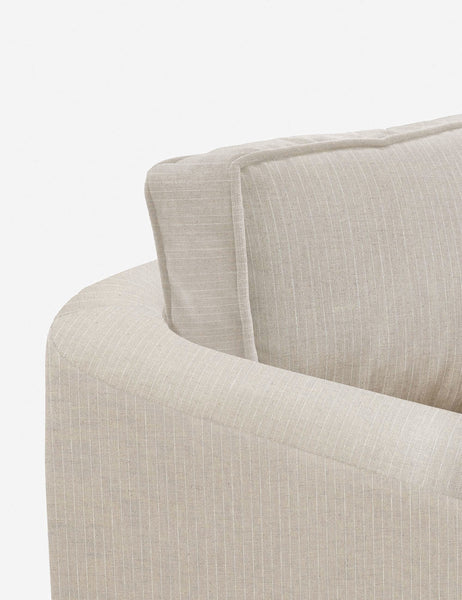 #color::stripe | Close-up of the curved back on the Belmont Stripe linen accent chair