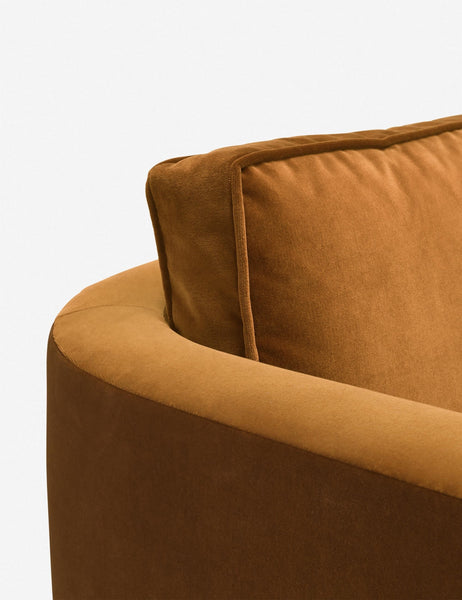 #color::cognac | Close-up of the curved back on the Belmont Cognac velvet accent chair