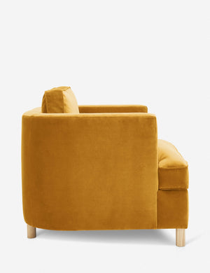 Side of the Belmont goldenrod velvet accent chair