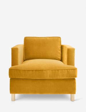 Belmont goldenrod velvet accent chair by Ginny Macdonald with a curved back and oversized plush cushions