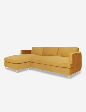 Angled view of the Belmont Goldenrod Velvet left-facing sectional sofa
