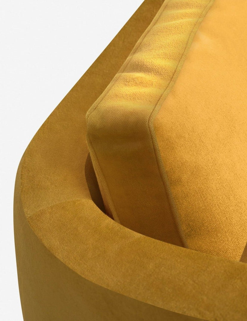#color::goldenrod-velvet #configuration::left-facing | The curved back on the Belmont Goldenrod Velvet right-facing sectional sofa