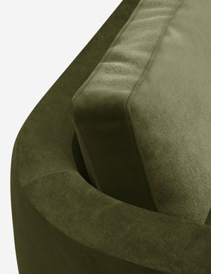 The curved back on the Belmont Jade Green Velvet left-facing sectional sofa