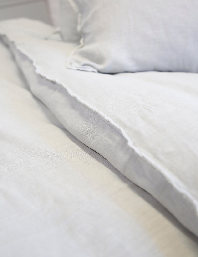 #color::ocean #size::king #size::queen | Close-up of the light gray blair stonewashed linen duvet by pom pom at home