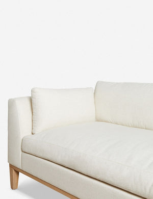 Inner corner of the Charleston ivory right-facing sectional sofa