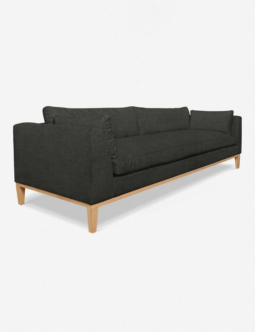 #size::10-w #size::6-w #size::7-w #size::8-w #color::charcoal #size::9-w | Angled view of the Charleston charcoal gray linen sofa 