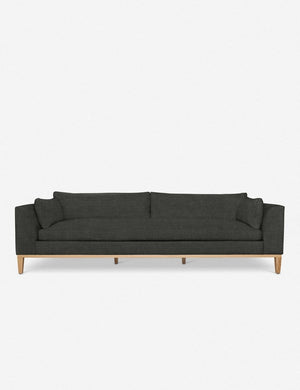 Charleston charcoal gray linen sofa with a single seat cushion, natural oak base, and gently curved arms