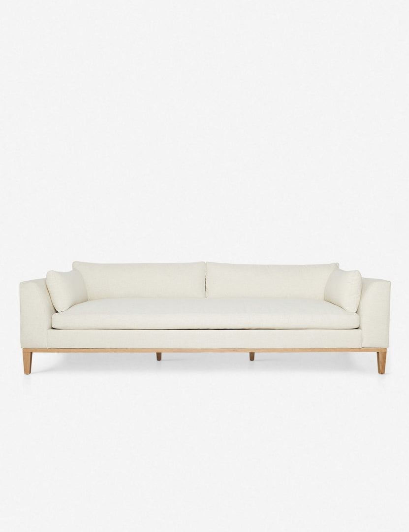 #size::10-w #size::6-w #size::7-w #size::8-w #color::ivory #size::9-w | Charleston Ivory Linen sofa with a single seat cushion, natural oak base, and gently curved arms