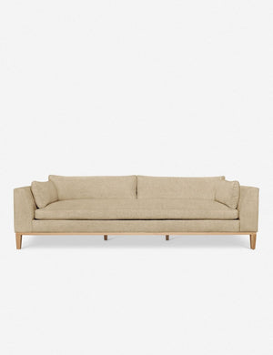 Charleston Linen sofa with a single seat cushion, natural oak base, and gently curved arms