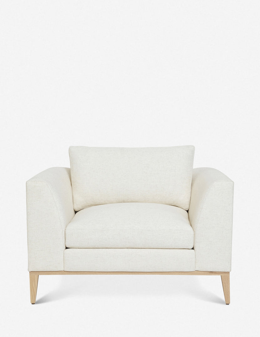 #color::ivory | Charleston ivory linen upholstered accent chair with a natural oak base and a deep plush seat