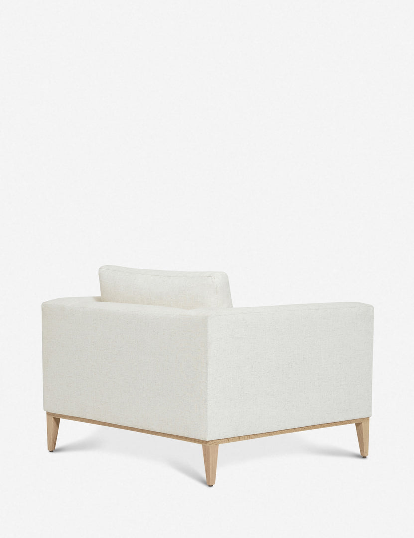 #color::ivory | Angled rear-view of the Charleston ivory linen accent chair