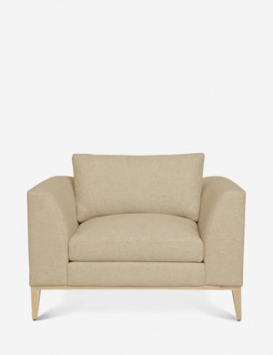 Charleston Natural Linen upholstered accent chair with a natural oak base and a deep plush seat