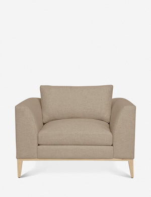 Charleston Pebble gray linen upholstered accent chair with a natural oak base and a deep plush seat