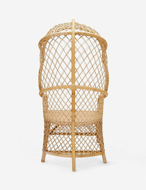 Rear view of the Charley rattan accent chair with sloping back