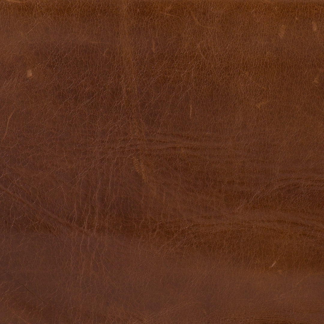 | Close-up of the brown leather for the Marlyne accent chair