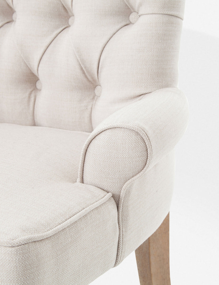 | Close-up of the low arm on the Lucita dining bench