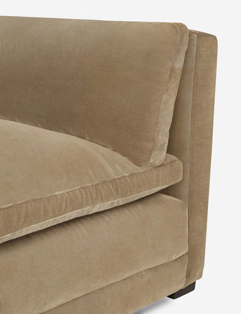 #color::camel | Close-up of the end of the Elvie Camel beige Velvet chaise