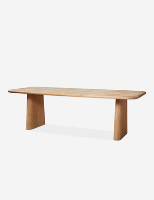 Side view of Mela oak wood dining table.