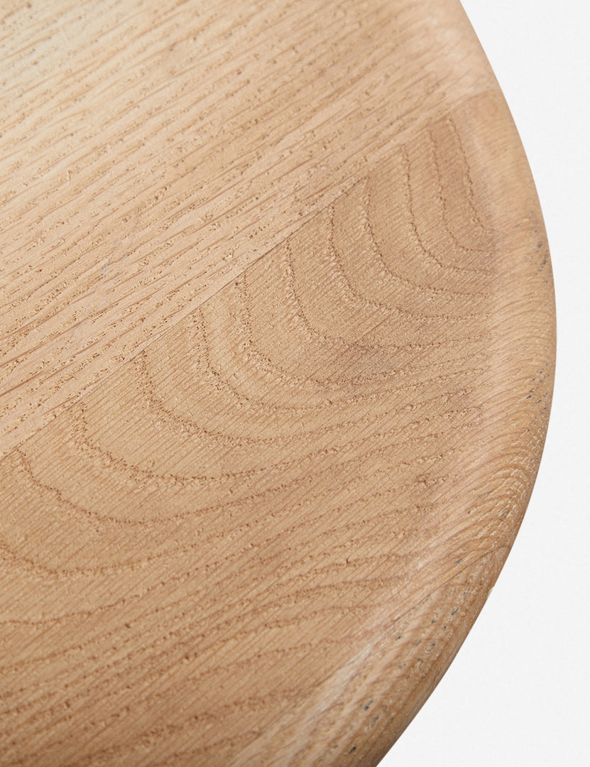 #color::natural | Close-up of the oak wood texture on the Mela oak wood dining table.