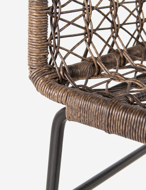 The open-woven wicker construction on the Eliza Indoor / Outdoor Accent Chair