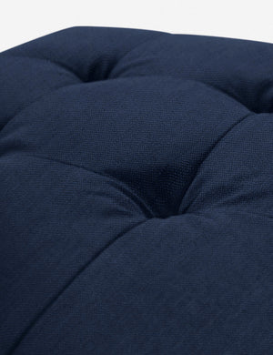 Button tufting on the cushion of the Dark Blue Linen Grasmere Ottoman