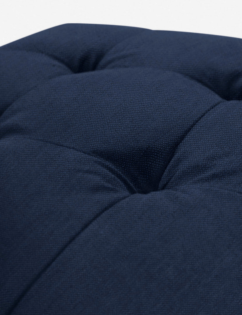 #color::dark-blue | Button tufting on the cushion of the Dark Blue Linen Grasmere Ottoman