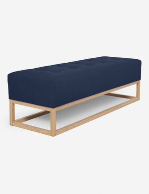 Angled view of the Grasmere dark blue linen wooden bench