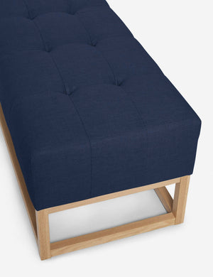 Upper angled view of the Grasmere dark blue linen wooden bench