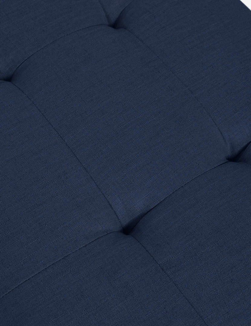 #color::dark-blue | Close-up of the button tufting on the Grasmere bench