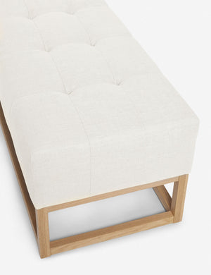 Upper angled view of the Grasmere oyster white linen wooden bench