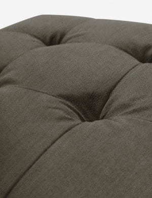 Button tufting on the cushion of the Loden Gray Linen Grasmere Ottoman