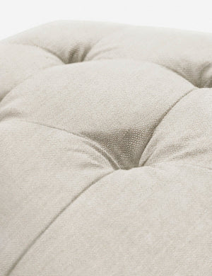 Button tufting on the cushion of the Natural Linen Grasmere Ottoman
