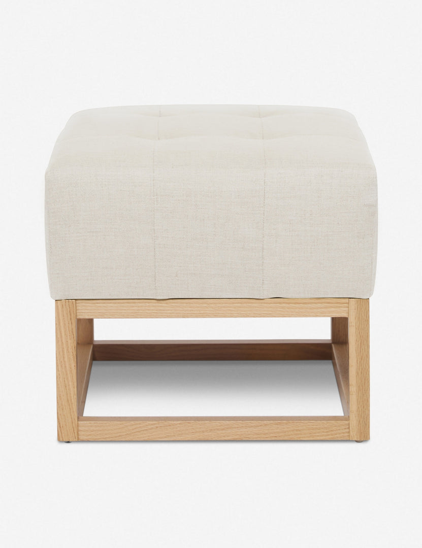 #color::natural | Natural Linen Grasmere Ottoman with an upholstered cushion and airy wooden frame by Ginny Macdonald