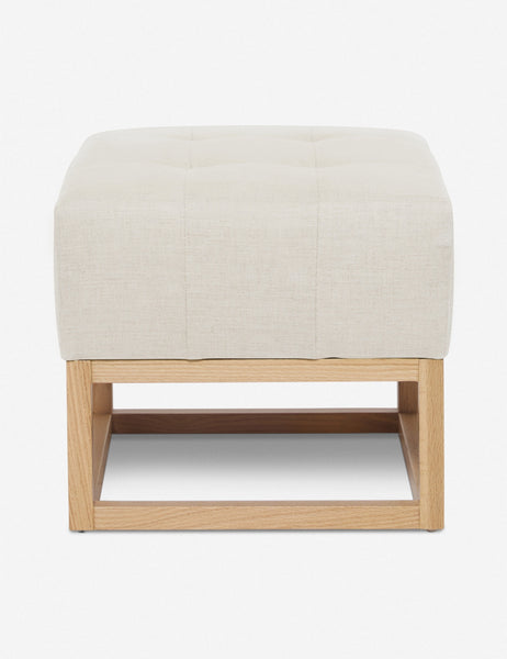 #color::natural | Natural Linen Grasmere Ottoman with an upholstered cushion and airy wooden frame by Ginny Macdonald