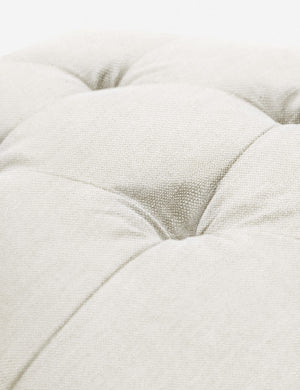Button tufting on the cushion of the Oyster White Linen Grasmere Ottoman