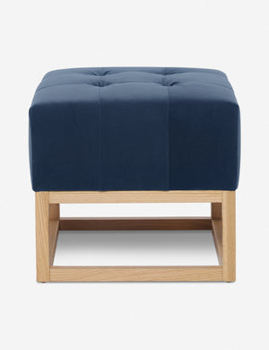 Harbor Blue Velvet Grasmere Ottoman with an upholstered cushion and airy wooden frame by Ginny Macdonald
