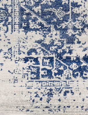 Detailed shot of the Prisha bohemian style distressed white and blue rug