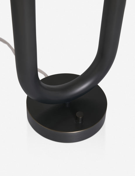 #color::oil-rubbed-bronze | Close-up of the base of the Happy black, oil-rubbed bronze table lamp by Regina Andrew with a dual-metal tube silhouette with contrasting matte white bumbs