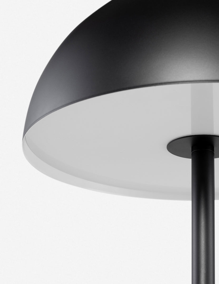 #color::black | Close-up of the acrylic light diffuser on the Luz black dome table  lamp