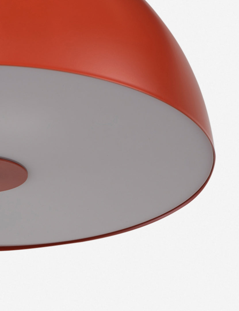 #color::terracotta | Close-up of the acrylic light diffuser on the Luz red dome table lamp
