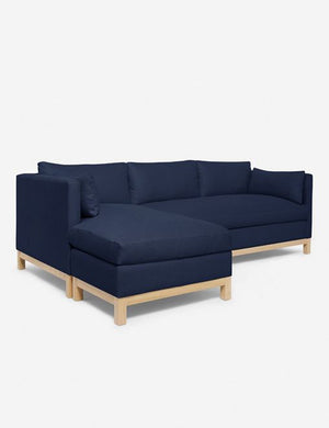 Left angled view of the Hollingworth Dark Blue Linen sectional sofa