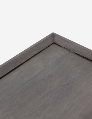 Close-up of the corner and walled border of the Alison geometric square coffee table