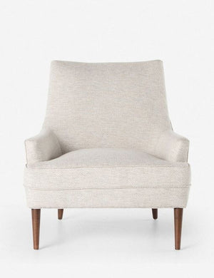 Ilona ivory upholstered winged accent chair with tapered legs