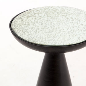 Close-up of the upper-half of the Bridget bronze pedestal side table with mirror ash glass top