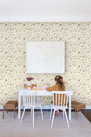 The Garden Birds Wallpaper by Rylee + Cru is in a kid's room with a white children's desk, two desk chairs, and two woven stools