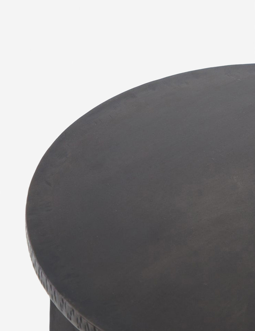 | Close-up of the surface of the Illy metal geometric side table