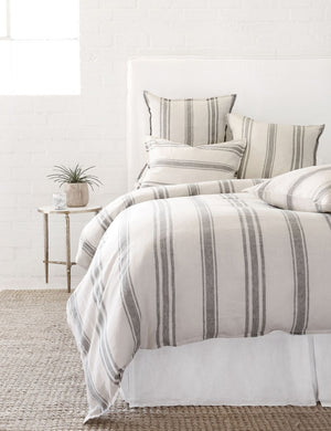 Close up of the Jackson Linen flax and midnight striped Duvet by Pom Pom at Home