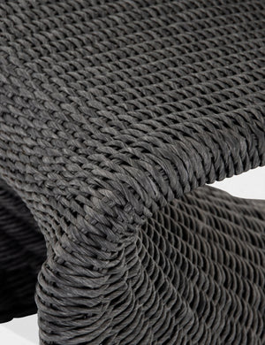 Detailed shot of the black woven wicker on the Manila wicker weave black indoor and outdoor dining chair