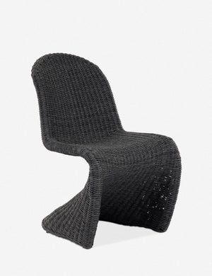 Angled view of the Manila wicker weave black indoor and outdoor dining chair