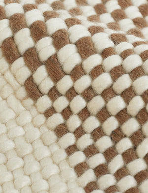 Close up of the handwoven construction on the Joelle rust rug